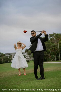 Couple on Golf Course with White Skirt and Black Suit
