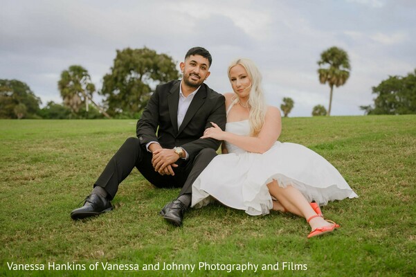 couple photoshoot,outdoor portraits,white dress,black suit,formal attire,green grass,orange shoes