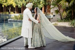 Couple by Water with Flowing Dupatta