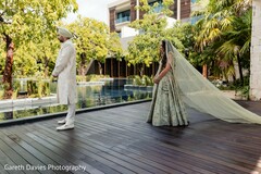 Bride in Mint Lehenga and Groom in Cream Sherwani Outdoors