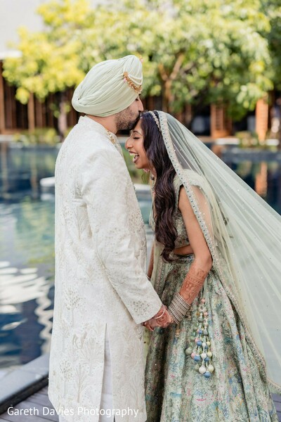 couple portrait,sherwani,turban,lehenga,bangles,mehndi