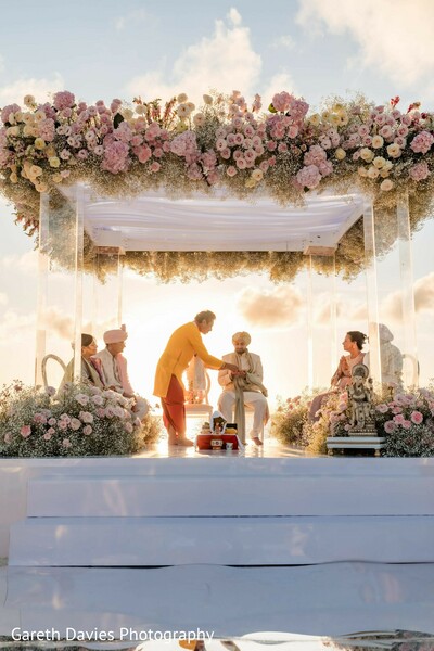outdoor ritual,floral decor,arch,pink flowers,cream flowers,ritual setup,photography
