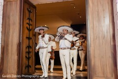Musicians in Sombreros Enter Through Doors
