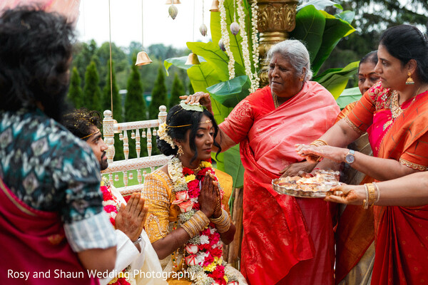 gold sari,yellow sari,floral garlands,traditional attire