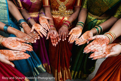 Multiple Hands Adorned with Intricate Mehndi Designs