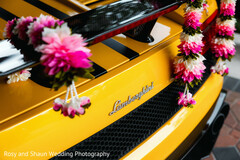 Yellow Lamborghini Decorated with Pink and White Floral Garlands