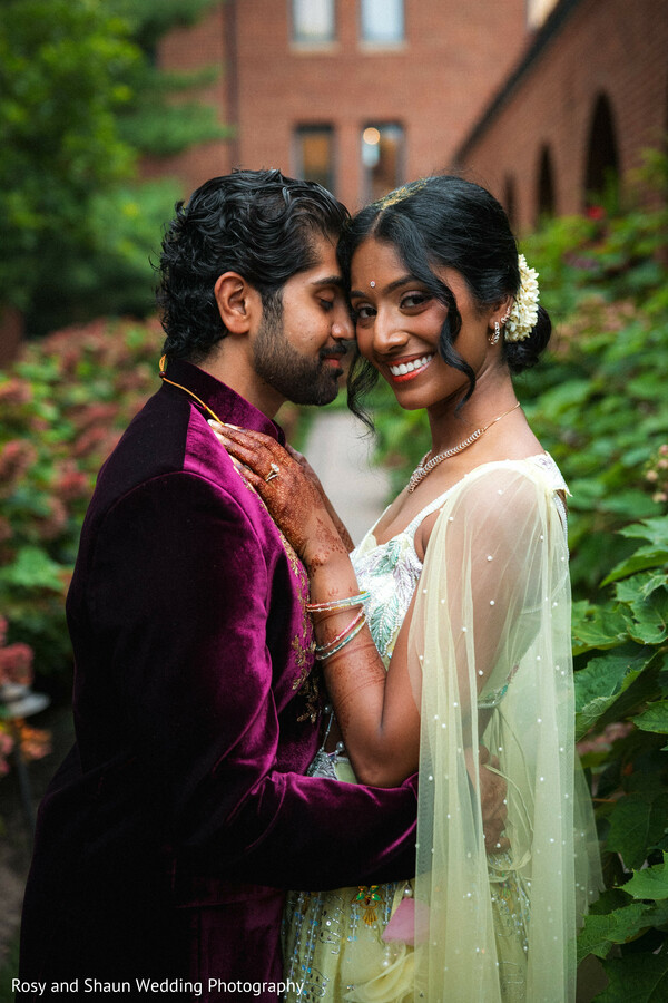 couple portrait,plum sherwani,mehndi,gajra,bindi,photo session,sari,groom fashion,bridal fashion