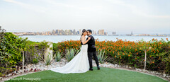 Stunning Waterfront Wedding Portraits with City Skyline Backdrop
