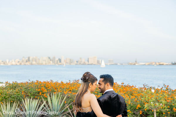 couple portrait,outdoor,water,cityscape,tuxedo jacket,romantic