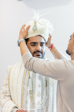 Groom's White Turban Being Placed