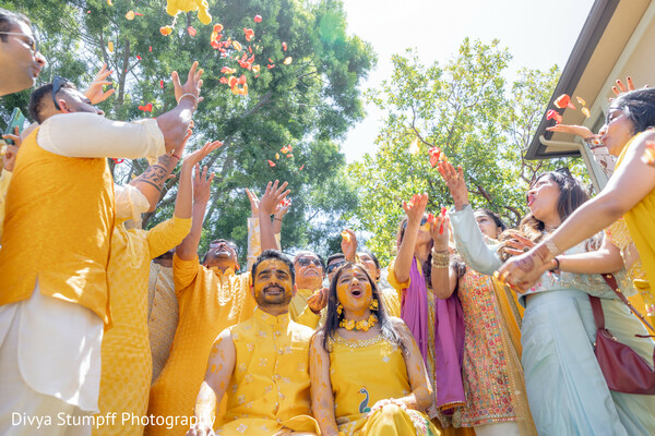 yellow attire,petal shower,vibrant colors