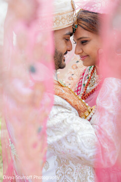 Couple's Intimate Portrait with Pink Fabric Foreground
