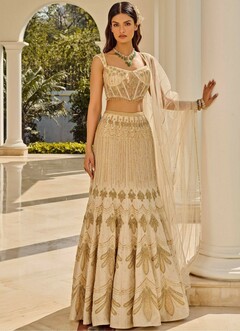 Cream Lehenga with Gold Embroidery and Green Beaded Necklace