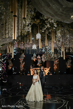 Elegant Reception with Draped Ceilings and Gold Accents