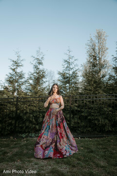 Bride in Colorful Floral Lehenga for Outdoor Photoshoot