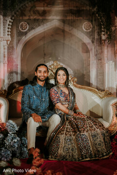 Couple Poses on Ornate White and Gold Sofa