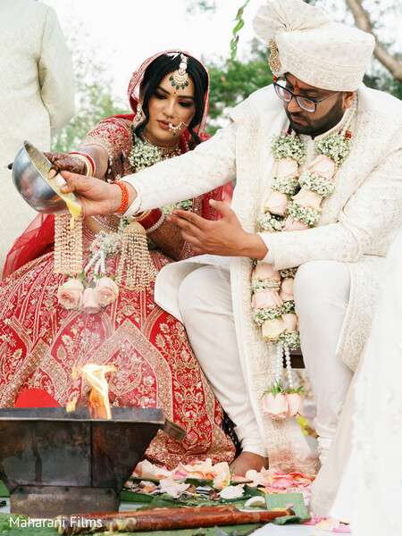 ritual,woman,man,red outfit,white outfit,fire,offerings