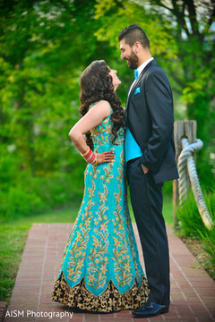 Indian Bride and Groom Outdoor turquoise lengha,turquoise and gold lengha,bride and groom,bride and groom portrait,outdoors photography,outdoor indian photography