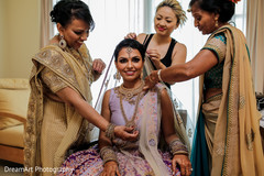 Beautiful Indian bride during hair & makeup Beautiful Indian bride during hair & makeup