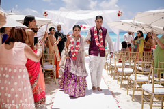 See the beautiful Indian couple walk the aisle as Mr. and Mrs. See the beautiful Indian couple walk the aisle as Mr. and Mrs.