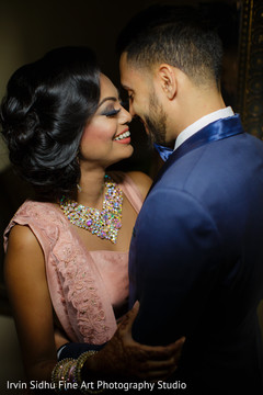 Lovely indian couple in their reception outfits Lovely indian couple in their reception outfits