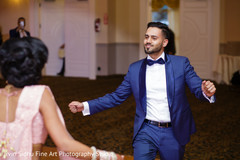 Happy Groom dancing at his Wedding Reception indian wedding dance,indian wedding,indian wedding celebration