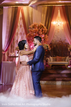 Beautiful Indian couple dancing at their wedding Beautiful Indian couple dancing at their wedding