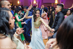 Beautiful Indian bride dancing at her wedding Beautiful Indian bride dancing at her wedding
