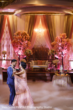 Indian couple having their first dance as Mr. and Mrs. Indian couple having their first dance as Mr. and Mrs.
