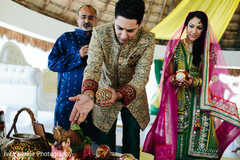 Shot of Indian bride and groom while their engagement celebration. Shot of Indian bride and groom while their engagement celebration.