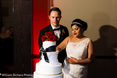 Bride and Groom Cutting Cake Bride and Groom Cutting Cake