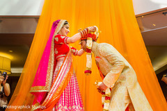 See this perfect moment of bride and groom exchanging garlands. indian wedding ceremony,indian wedding garlands,indian wedding floral and decor