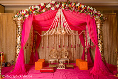Beautiful hot pink and flowered mandap.