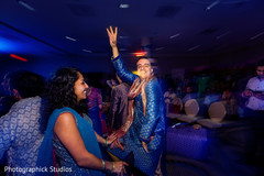 Guests enjoying at an indian wedding pre-celebration night. indian wedding pre -celebration,indian wedding,sangeet