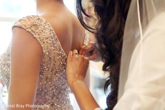 Bridesmaid getting dressed Bridesmaid getting dressed