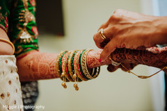 Lovely gold and green bridal bangles. Lovely gold and green bridal bangles.