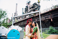 Indian bride and groom at an old factory venue. Indian bride and groom at an old factory venue.