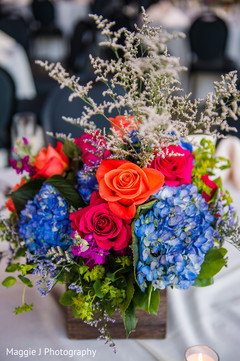 Blue orange and pink rustic floral centerpiece Blue orange and pink rustic floral centerpiece