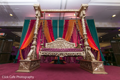 Beautiful golden garba swing for the bride and groom. Beautiful golden garba swing for the bride and groom.