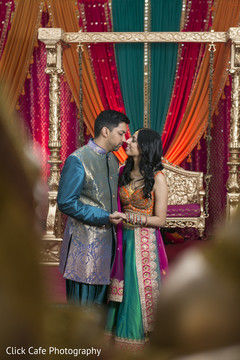 Lovely indian bride and groom during traditional garba celebration. Lovely indian bride and groom during traditional garba celebration.