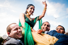 Indian groomsmen carrying the bride in their shoulders. Indian groomsmen carrying the bride in their shoulders.