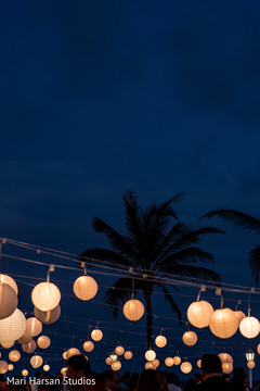 Beautiful paper lamps lightning the seaside party . Beautiful paper lamps lightning the seaside party .