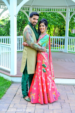 Indian bride and groom in their garba photo session. Indian bride and groom in their garba photo session.
