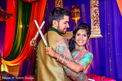See this colorful indian couple during their garba celebration. See this colorful indian couple during their garba celebration.