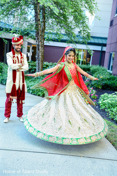 Indian bride showing her beautiful lengha. indian wedding photography,indian bride and groom,indian wedding photography session