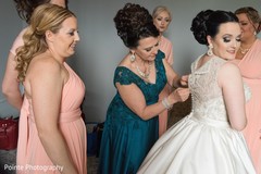 Beautiful bride getting ready for wedding ceremony Beautiful bride getting ready for wedding ceremony