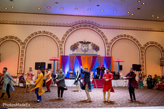 Men dancing in indian pre-wedding Sangeet night. Men dancing in indian pre-wedding Sangeet night.