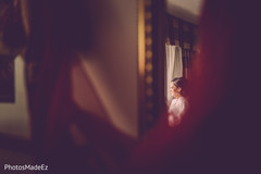 Lovely indian bride smiling while getting ready. Lovely indian bride smiling while getting ready.