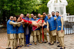 Indian groomsmen and groom in traditional blue and gold outfits. indian groomsmen,indian wedding photography session,indian groom