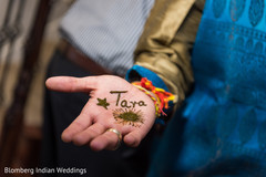 Indian groom with his maharani name in mehndi Indian groom with his maharani name in mehndi